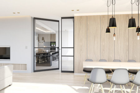 Loft Drehtür mit Seitenelement aus Aluminium & Glas – moderner Innenraum